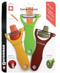 three vegetable peelers on a packaging card